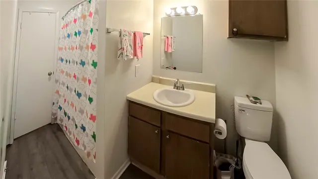 a bathroom with a sink and mirror