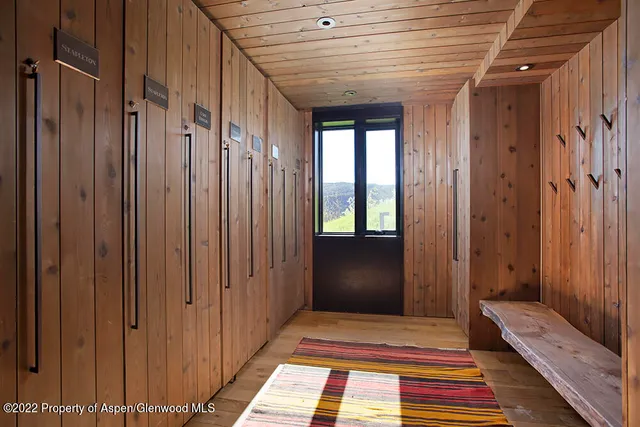 a view of bathroom with a rug and a shower