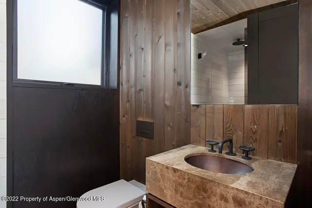 a view of a house with a snow on the mountain