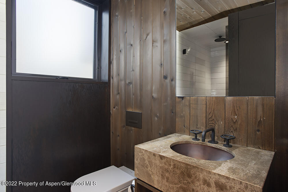 27 Turkey Trot Court Snowmass Village, CO 81615 - Photo 42 of 45 a bathroom with a sink toilet and shower