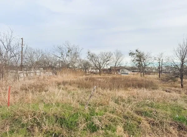 a view of lake with green space