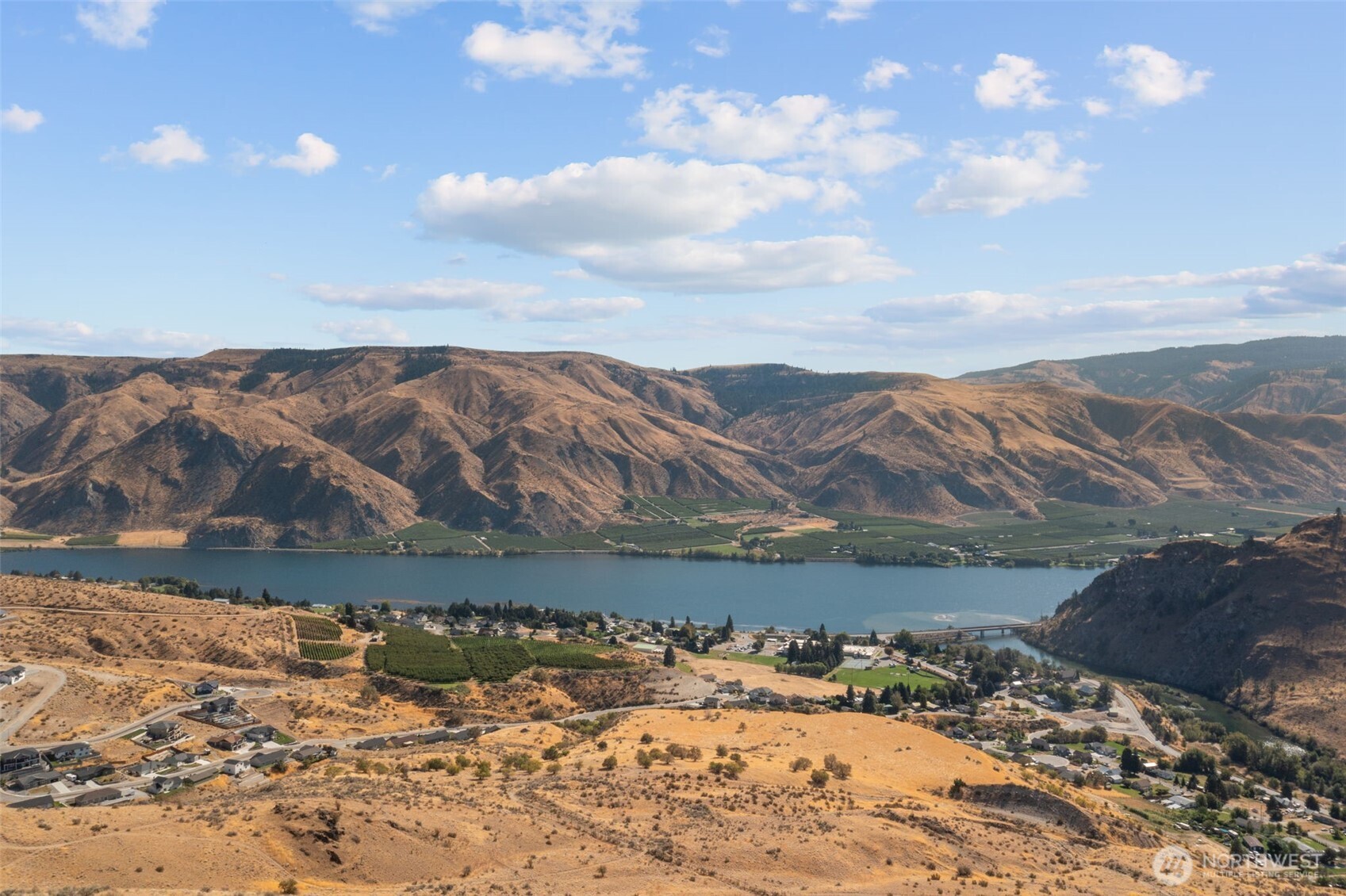 a view of ocean and mountains