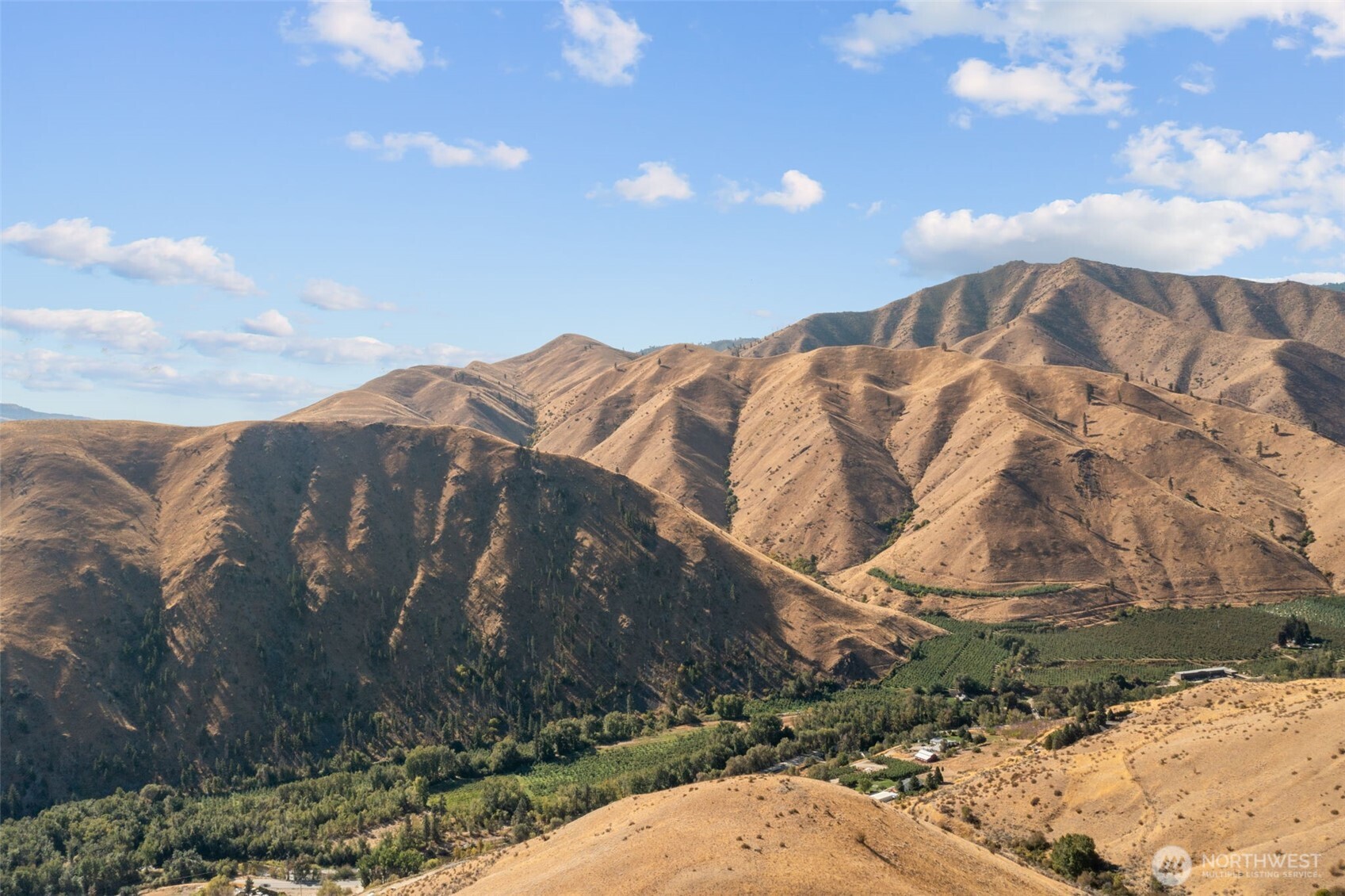 0 Entiat River Road, Unit LOT 5 Entiat, WA 98822 - Photo 25 of 36 a view of a house with a yard
