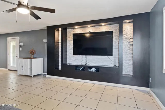 a living room with a flat screen tv