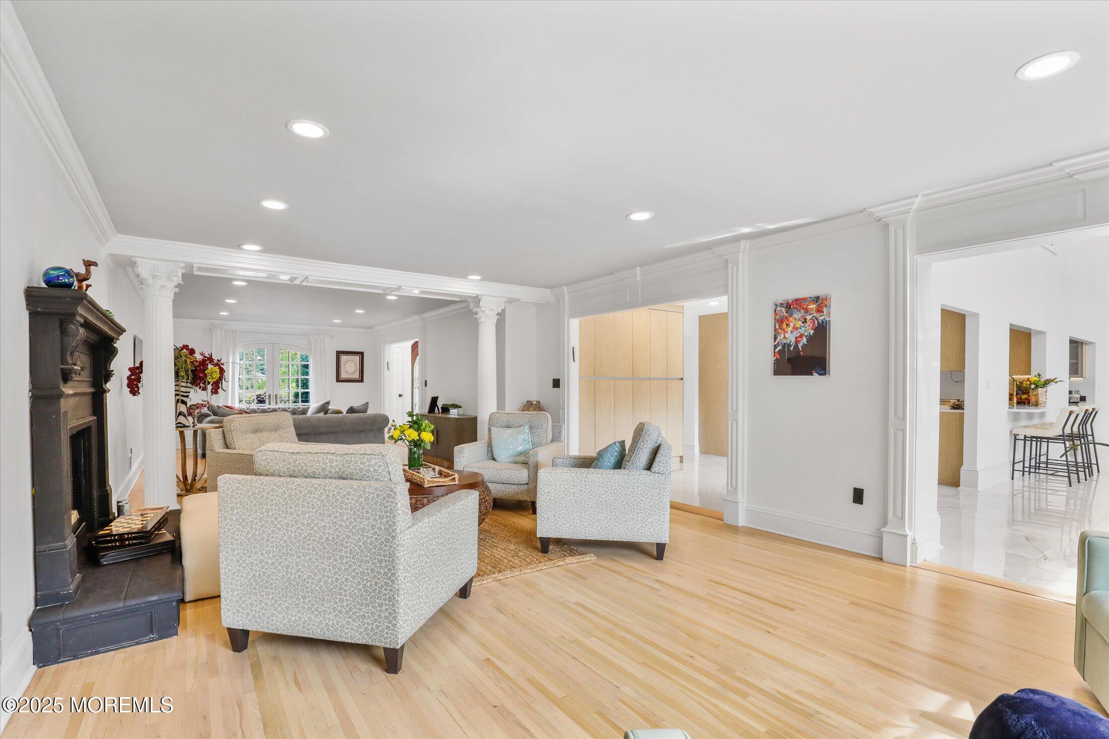 13 Valley Forge Road Eatontown, NJ 07724 - Photo 14 of 74 a living room with furniture and a wooden floor