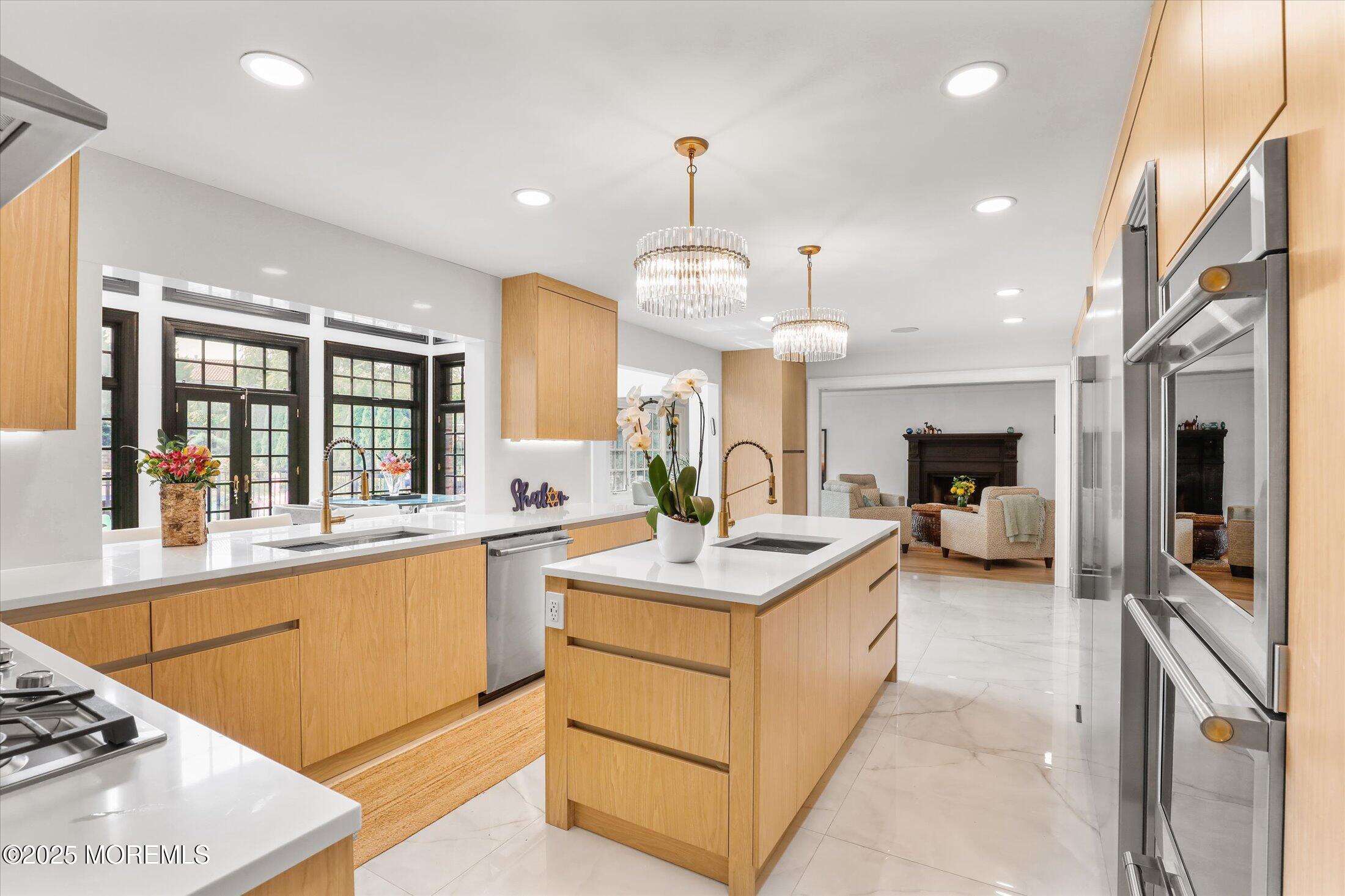 13 Valley Forge Road Eatontown, NJ 07724 - Photo 20 of 74 a large kitchen with stainless steel appliances granite countertop a lot of counter space and a sink