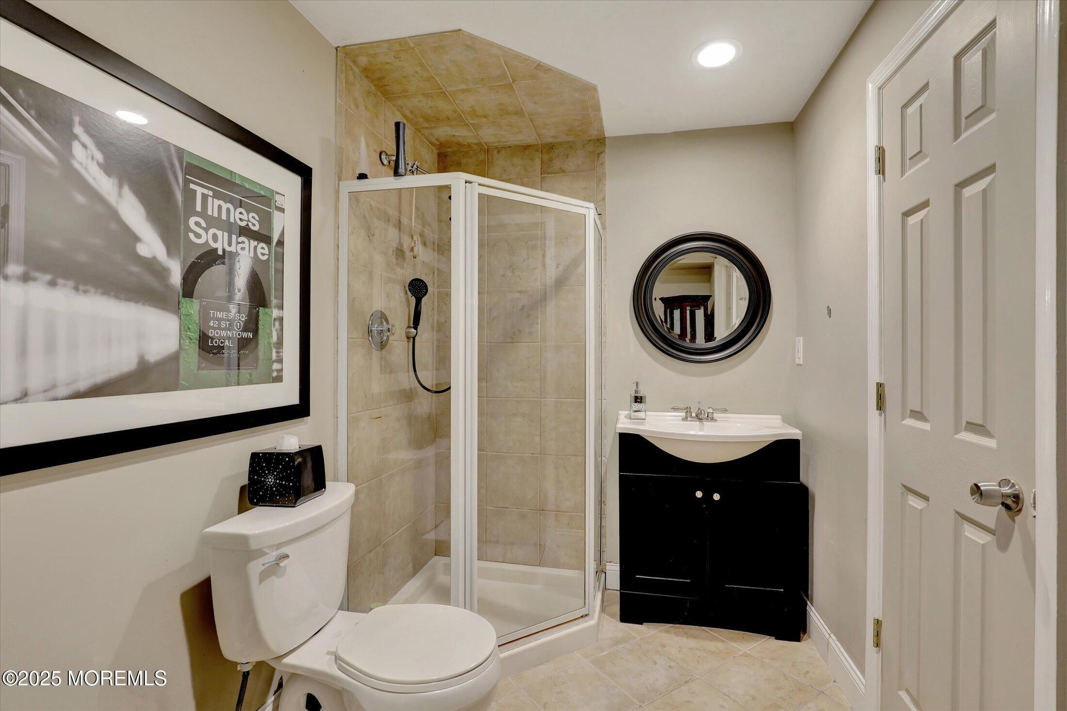 13 Valley Forge Road Eatontown, NJ 07724 - Photo 55 of 74 a bathroom with a sink a toilet and a shower