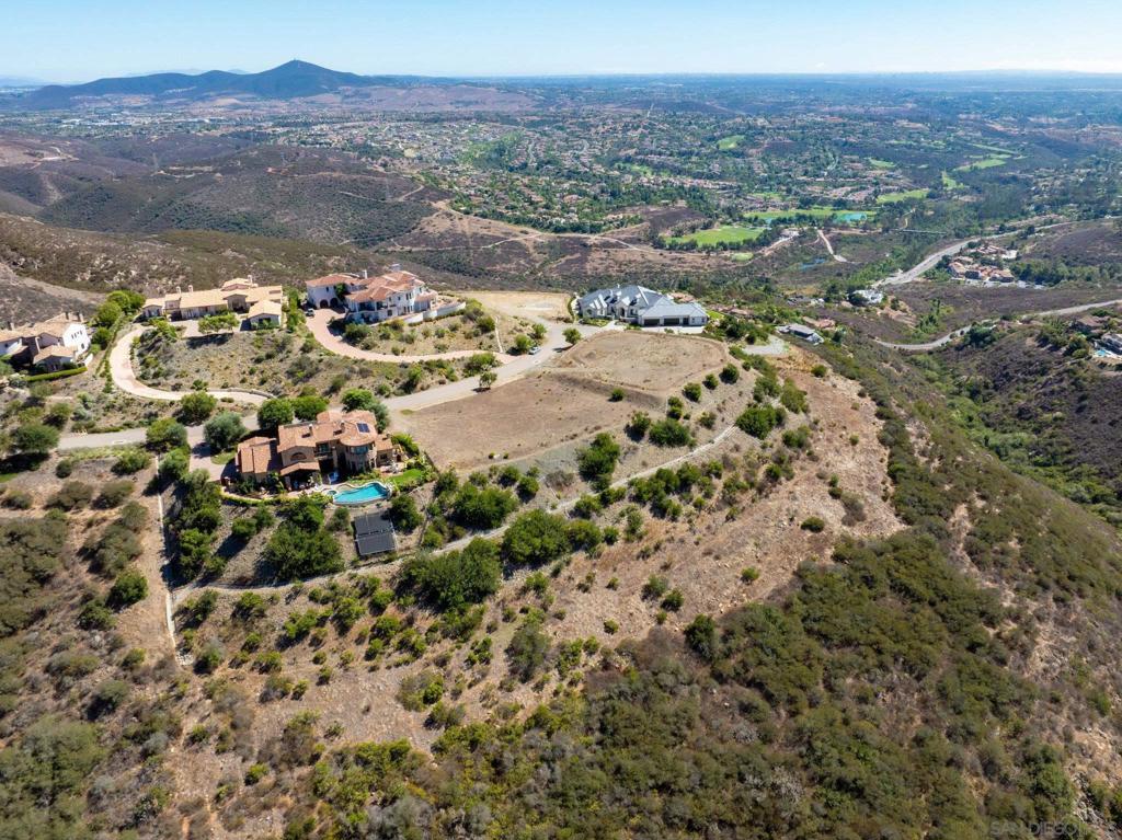 17928 El Brazo Rancho Santa Fe, CA 92067 - Photo 11 of 36 a view of a city with mountains in the background