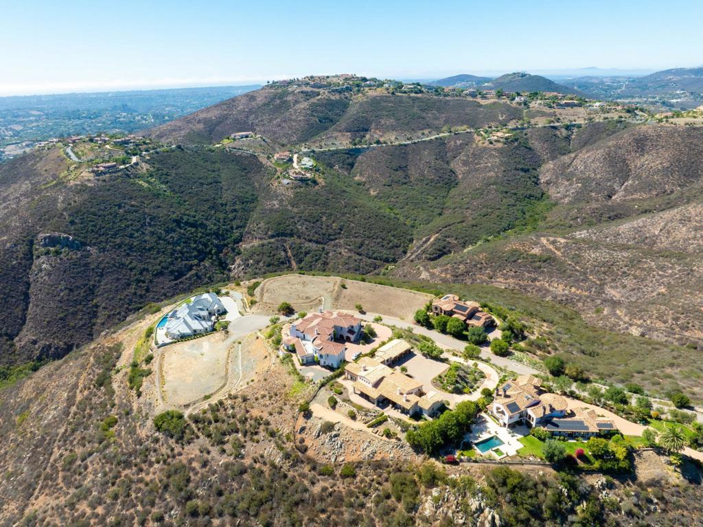 17928 El Brazo Rancho Santa Fe, CA 92067 - Photo 22 of 36 an aerial view of a house with a mountain