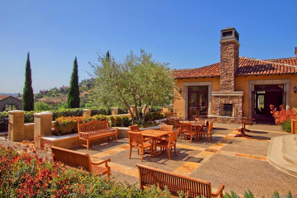 17928 El Brazo Rancho Santa Fe, CA 92067 - Photo 34 of 36 a view of a patio with couches table and chairs and potted plants