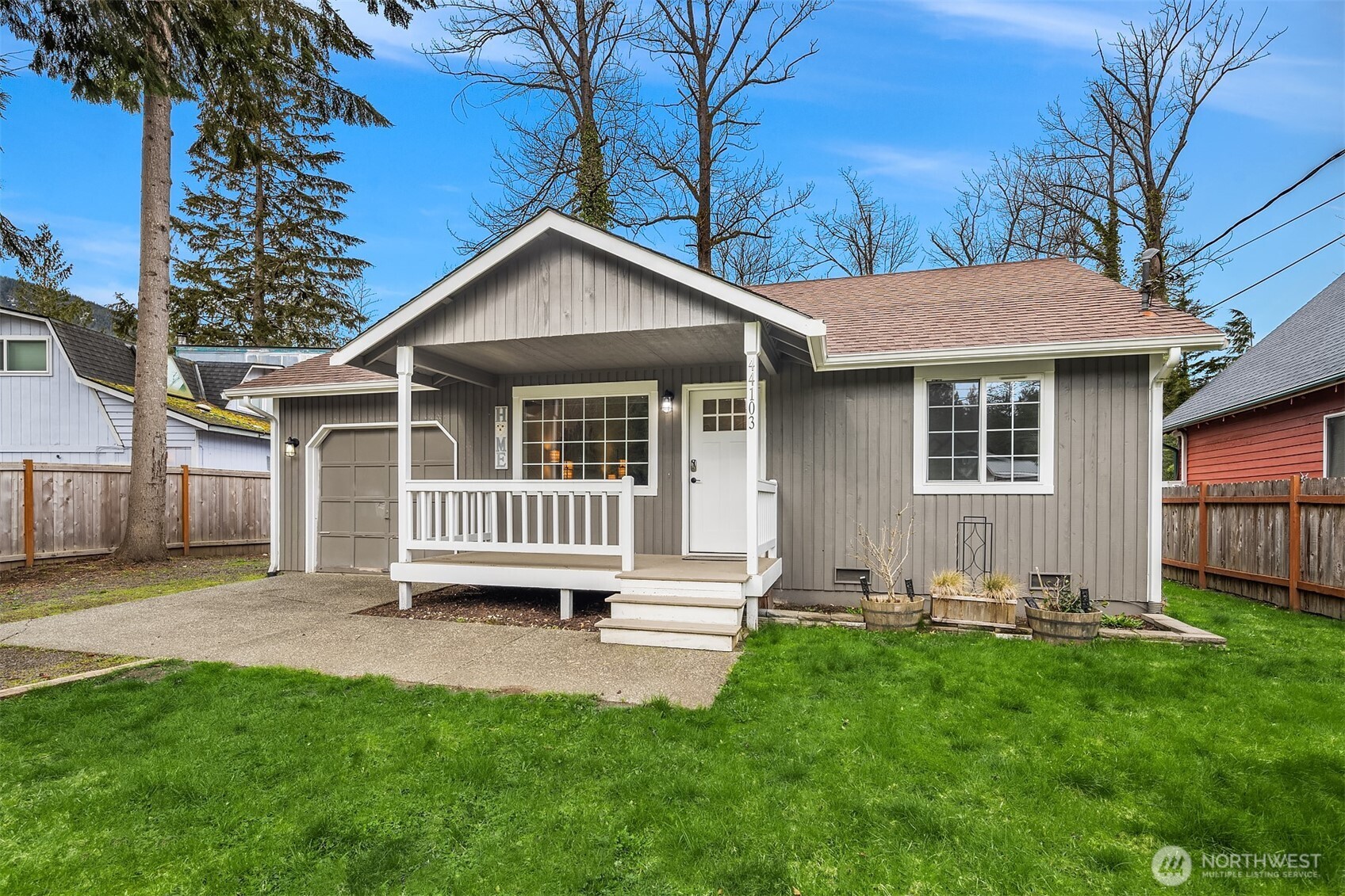 44103 Fir Road Gold Bar, WA 98251 - Photo 1 of 26 a view of a house with a yard and deck