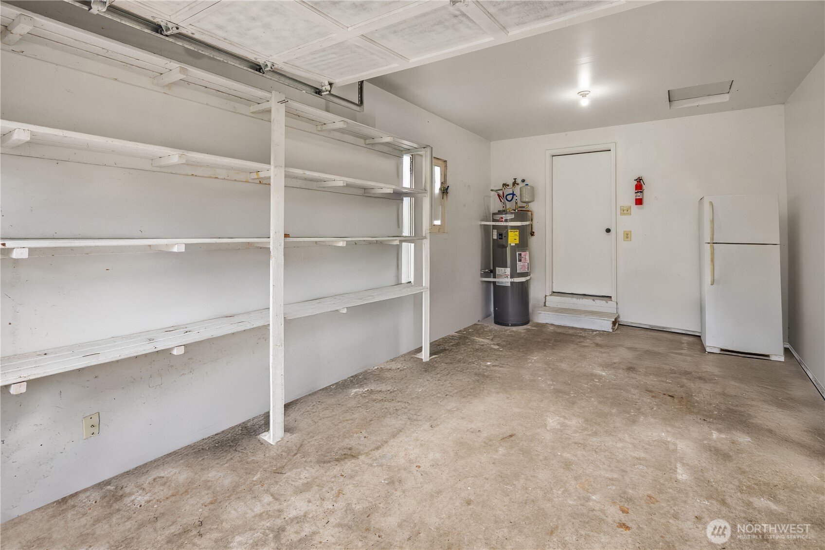 44103 Fir Road Gold Bar, WA 98251 - Photo 12 of 26 a view of a empty room with shelves