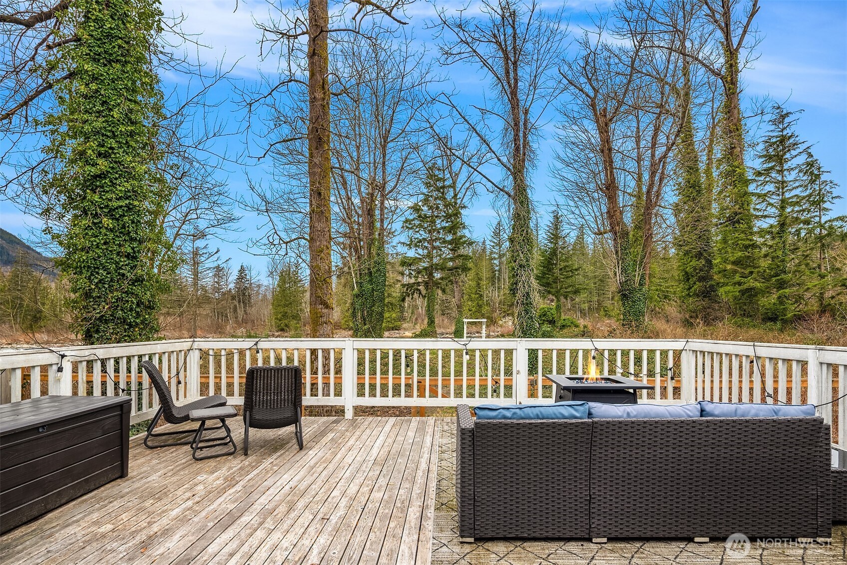 44103 Fir Road Gold Bar, WA 98251 - Photo 15 of 26 a view of a wooden deck with chairs