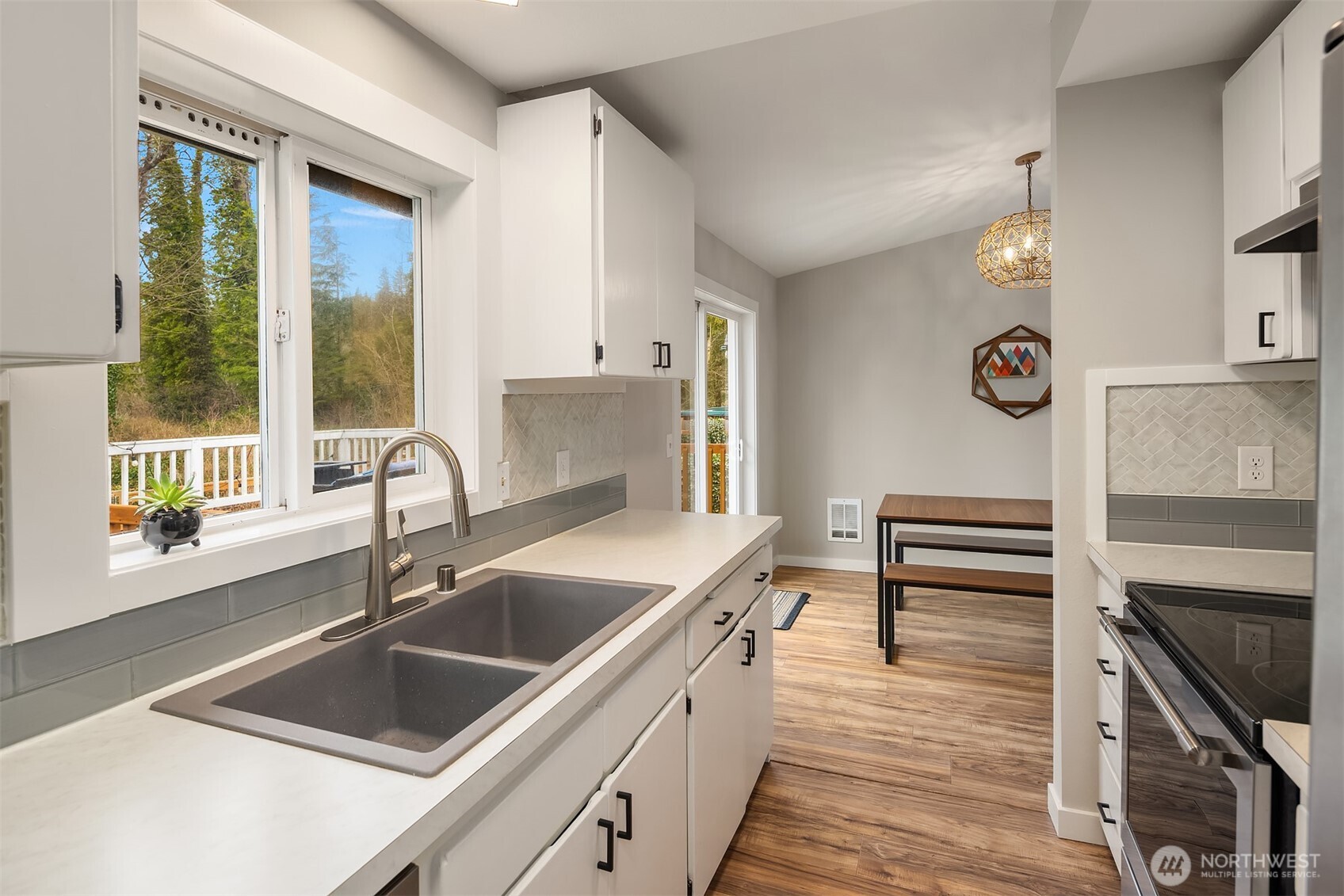 44103 Fir Road Gold Bar, WA 98251 - Photo 8 of 26 a kitchen with a sink cabinets and appliances
