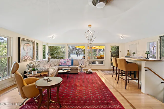 an aerial view of a house with a yard and garden