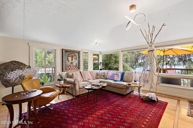 a aerial view of a house with swimming pool and big yard