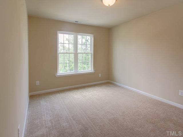 5022 Jelynn Street Raleigh, NC 27616 - Photo 14 of 18 Nice size room. It is a space that can be used to fit whatever your needs may be! Natural light and open. Very versatile room!