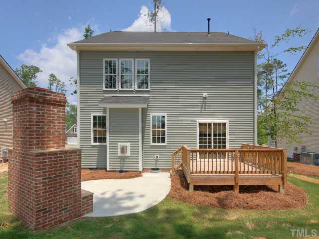 5022 Jelynn Street Raleigh, NC 27616 - Photo 17 of 18 Beautiful landscaped backyard! Nice size deck great for grilling out or enjoying the sun! Nice patio with outdoor fireplace that is perfect for those chilly nights that you still want to enjoy the outdoors!
