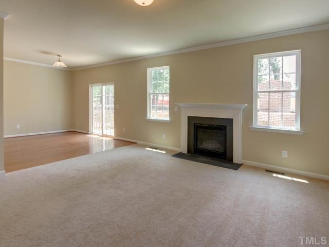 5022 Jelynn Street Raleigh, NC 27616 - Photo 5 of 18 Open access to the dining room allows you to eat and watch tv at the same time! Windows allow for great natural light and highlight the clean, neutral colors in the home.