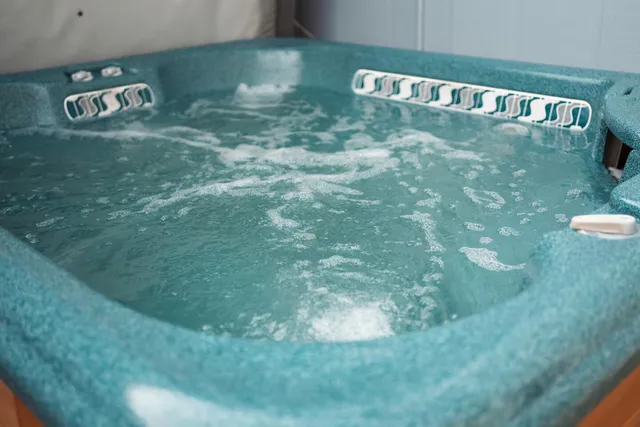 a view of a backyard with sitting area