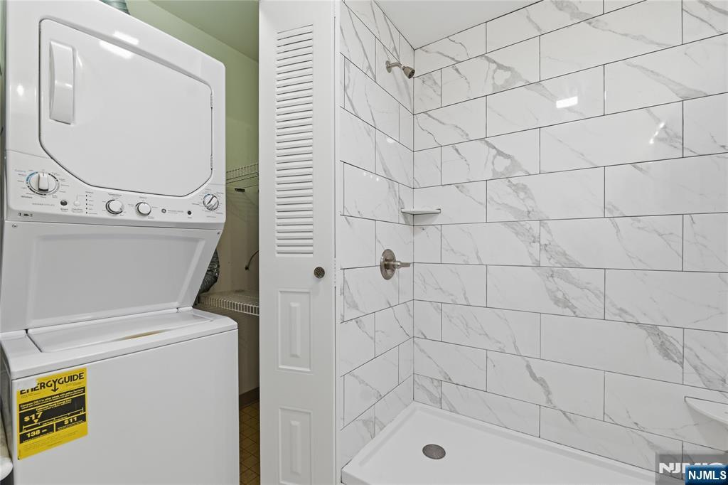 199 Union Avenue, Unit 1G Rutherford, NJ 07070 - Photo 14 of 17 a bathroom with a sink and a mirror