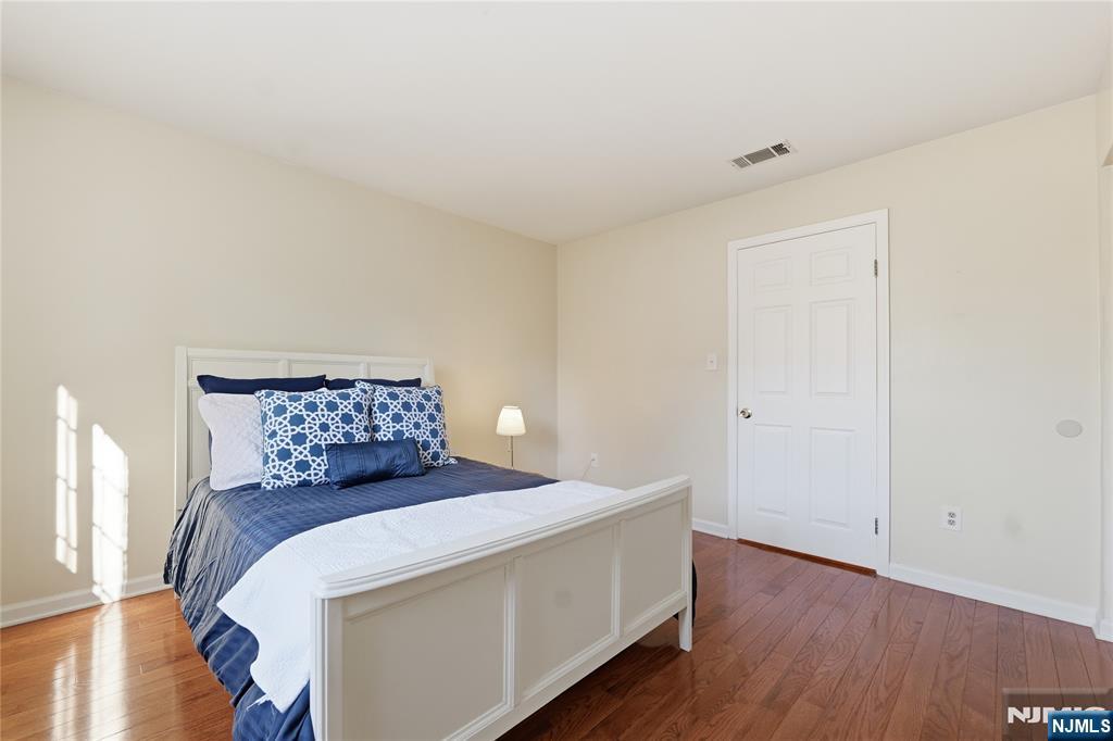 199 Union Avenue, Unit 1G Rutherford, NJ 07070 - Photo 17 of 17 a living room with furniture and wooden floor