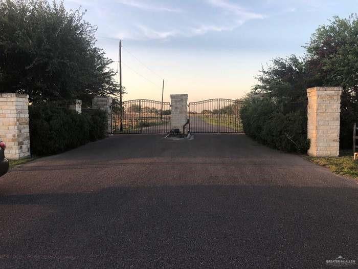 a view of a road with a yard