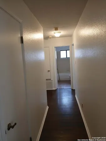 a view of hallway with stairs