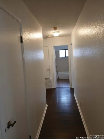 a view of hallway with stairs