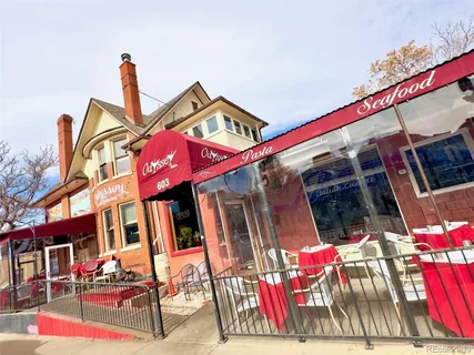 a view of a chairs and tables in patio