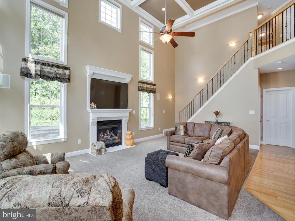 4021 Plum Point Road Huntingtown, MD 20639 - Photo 23 of 79 Living Room 2nd Staircase to Upstairs