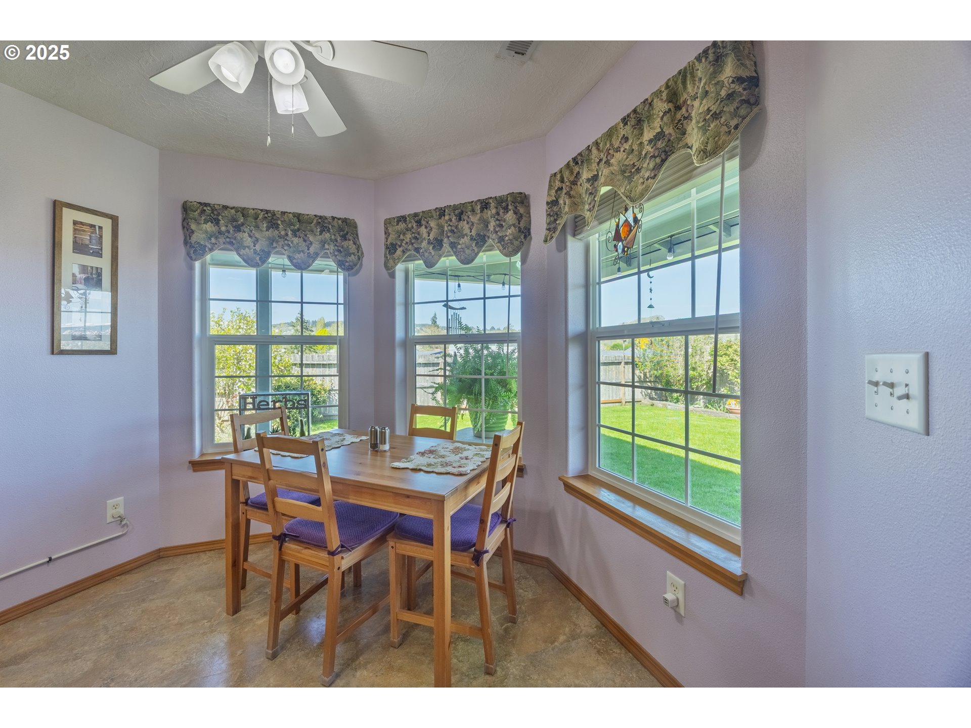788 Southeast Meadows Loop Sheridan, OR 97378 - Photo 16 of 45 a view of a dining room with furniture and a window
