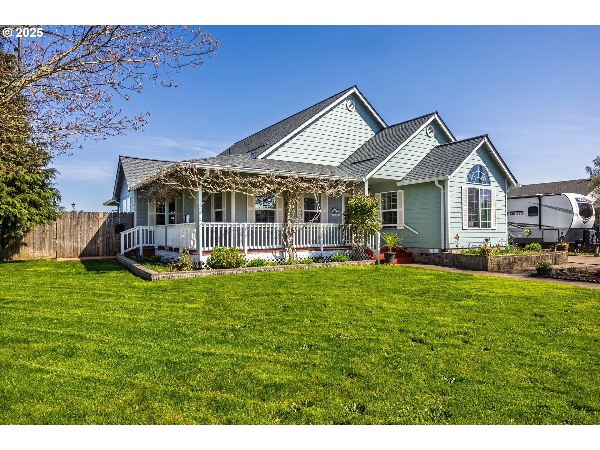 788 Southeast Meadows Loop Sheridan, OR 97378 - Photo 2 of 45 a view of a house with a backyard porch and sitting area