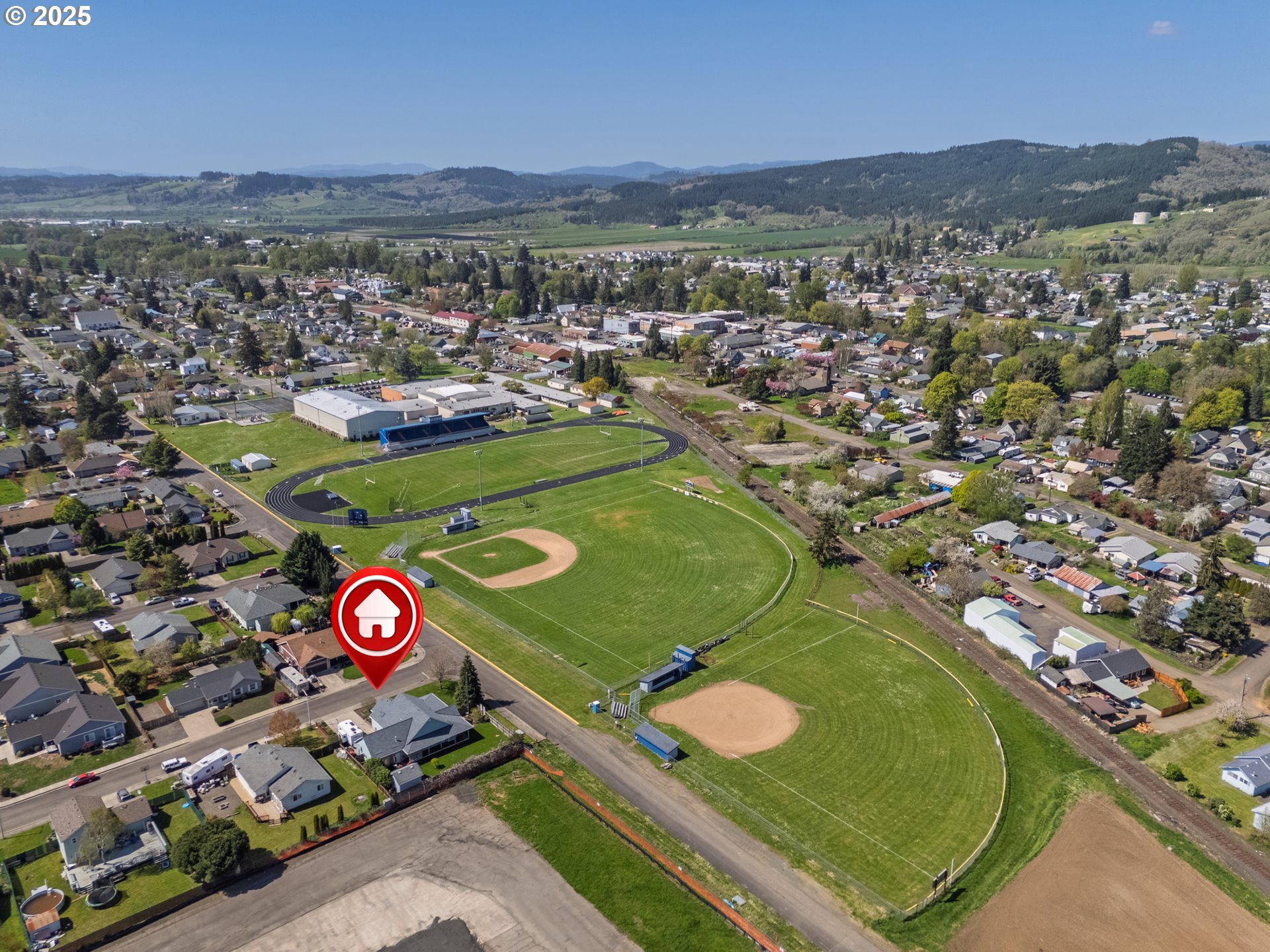 788 Southeast Meadows Loop Sheridan, OR 97378 - Photo 34 of 45 an aerial view of a red and white wall