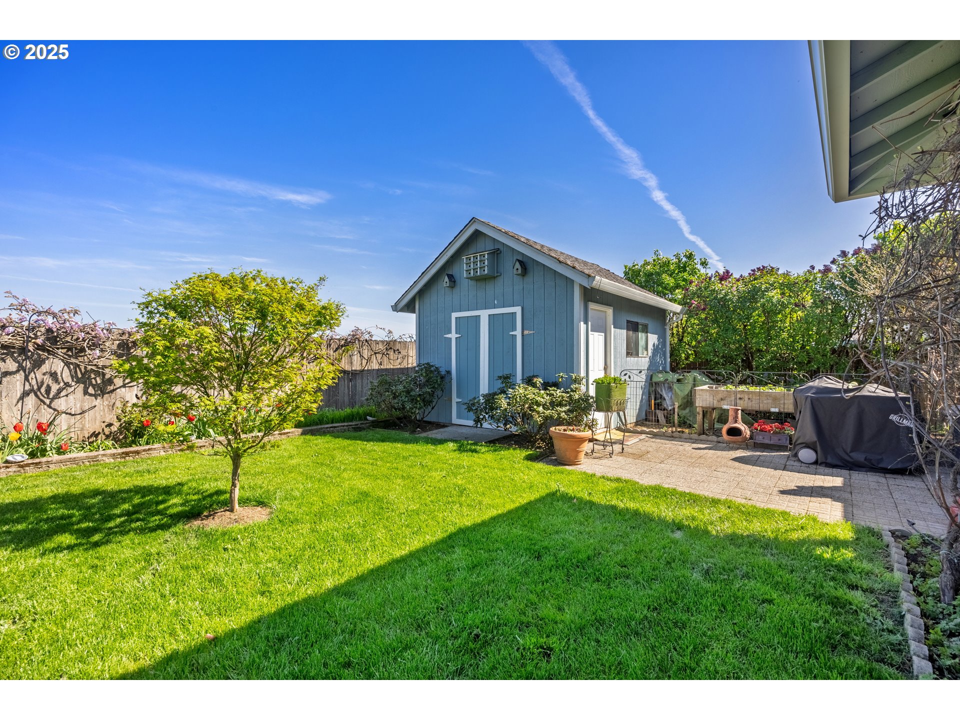 788 Southeast Meadows Loop Sheridan, OR 97378 - Photo 40 of 45 a view of a chair and table in backyard of the house
