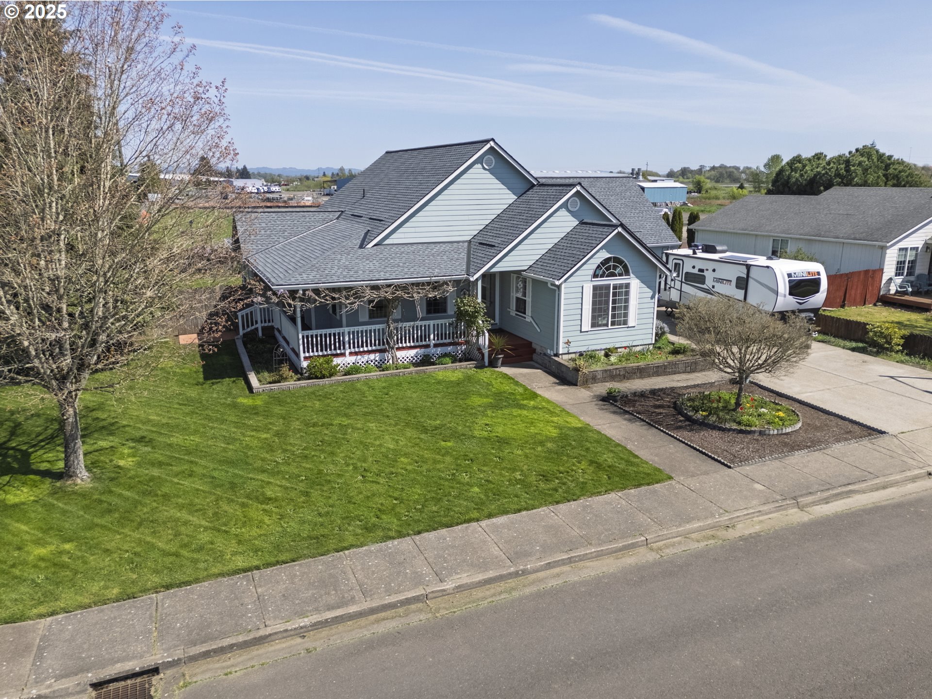 788 Southeast Meadows Loop Sheridan, OR 97378 - Photo 5 of 45 a front view of house with yard and green space