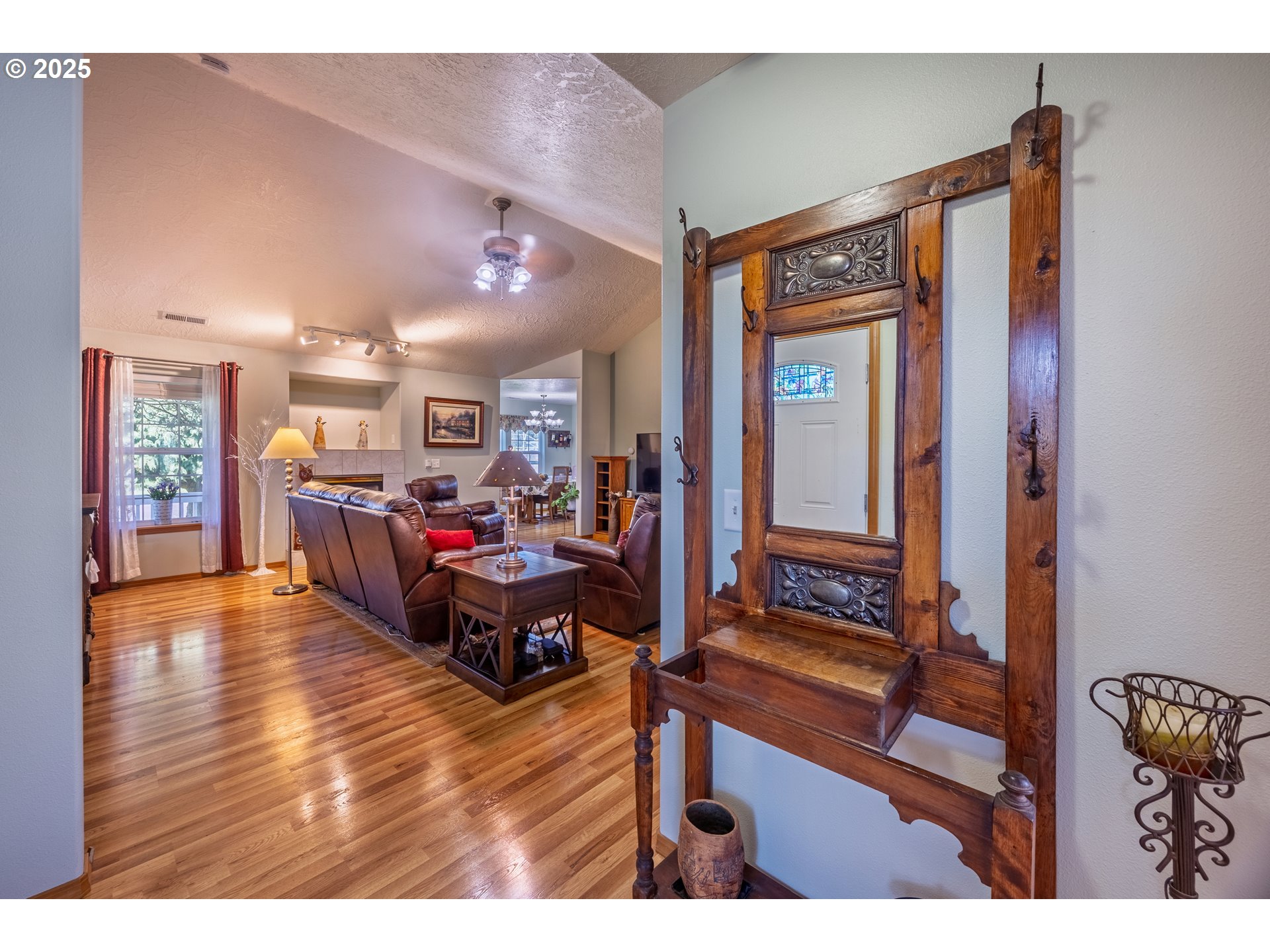 788 Southeast Meadows Loop Sheridan, OR 97378 - Photo 8 of 45 a living room with furniture and a wooden floor