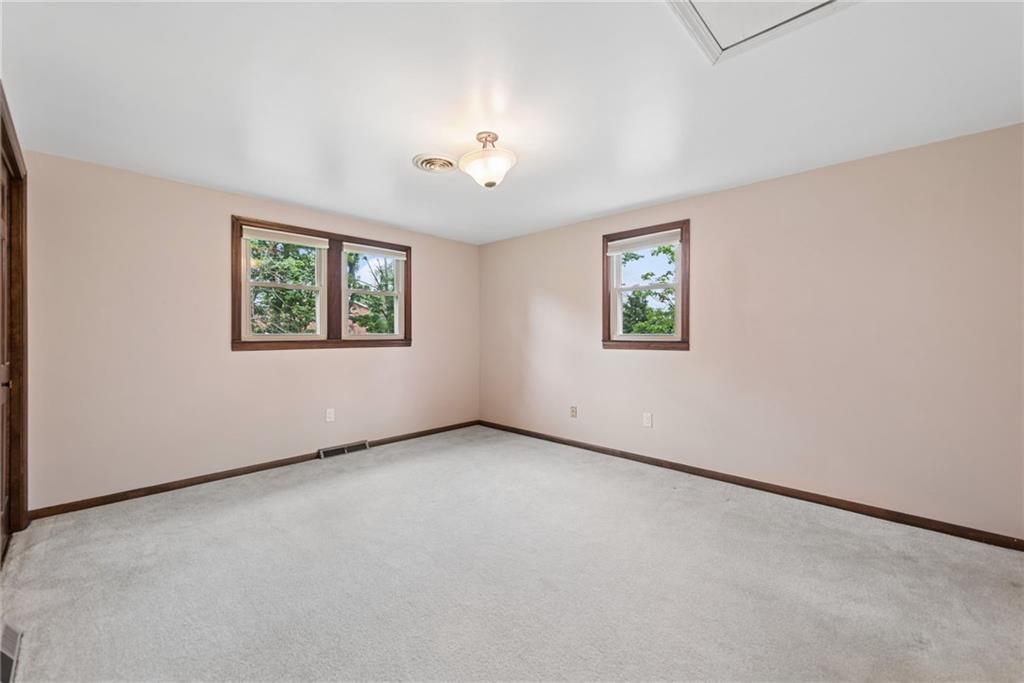 22 Buzzardtown Road Irwin, PA 15642 - Photo 28 of 44 an empty room with windows and closet