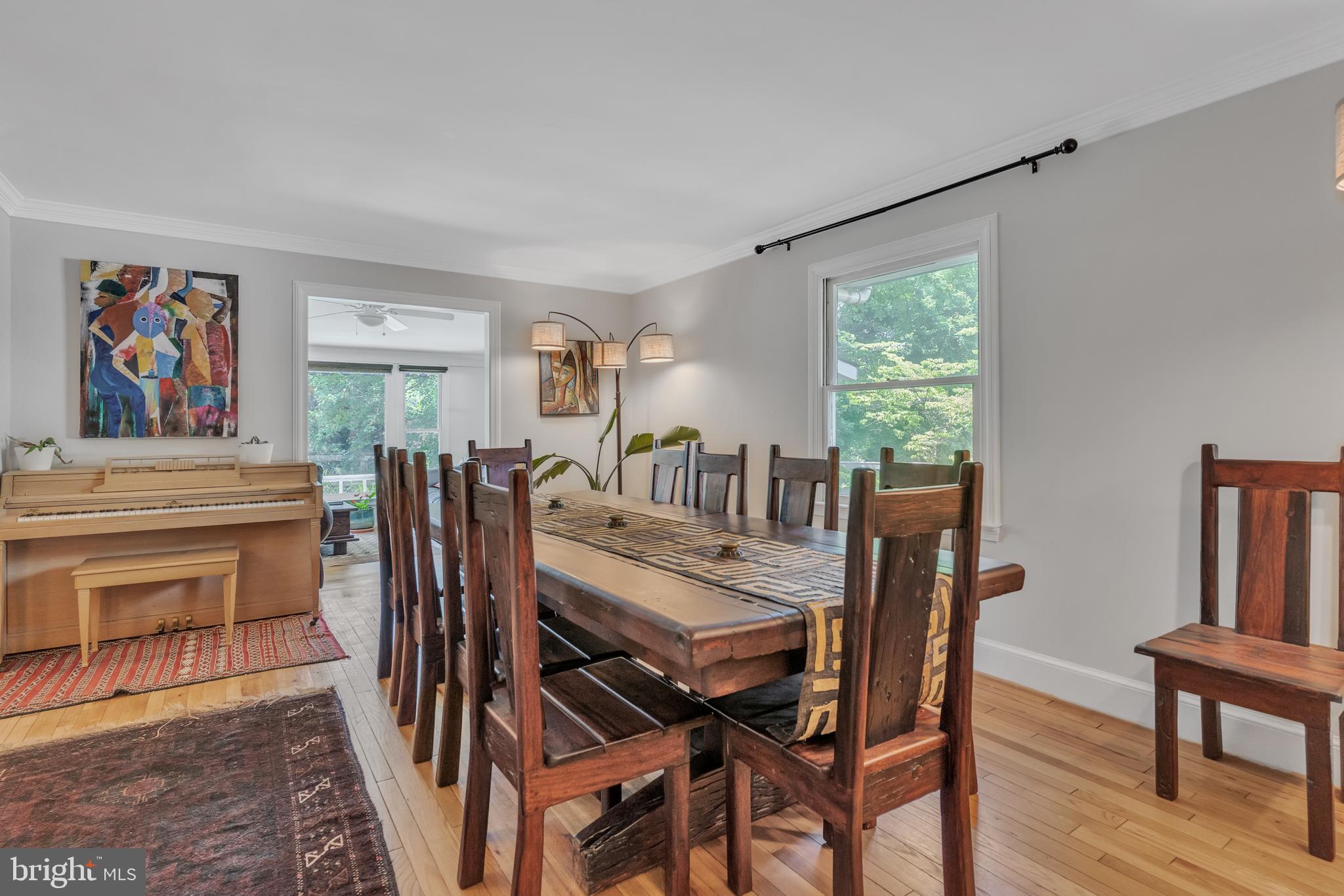 9329 Harvey Road Silver Spring, MD 20910 - Photo 7 of 40 a view of a dining room with furniture and a potted plant