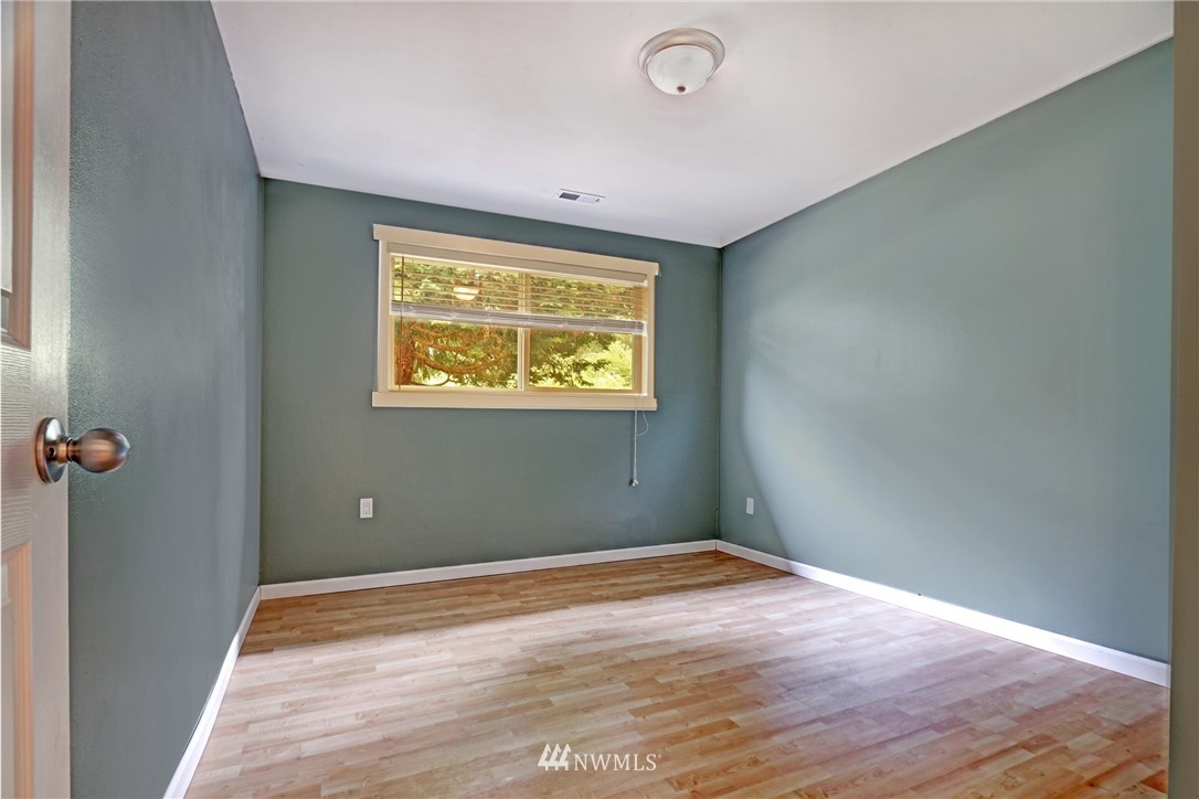 19670 Southeast 139th Place Renton, WA 98059 - Photo 13 of 25 an empty room with a window