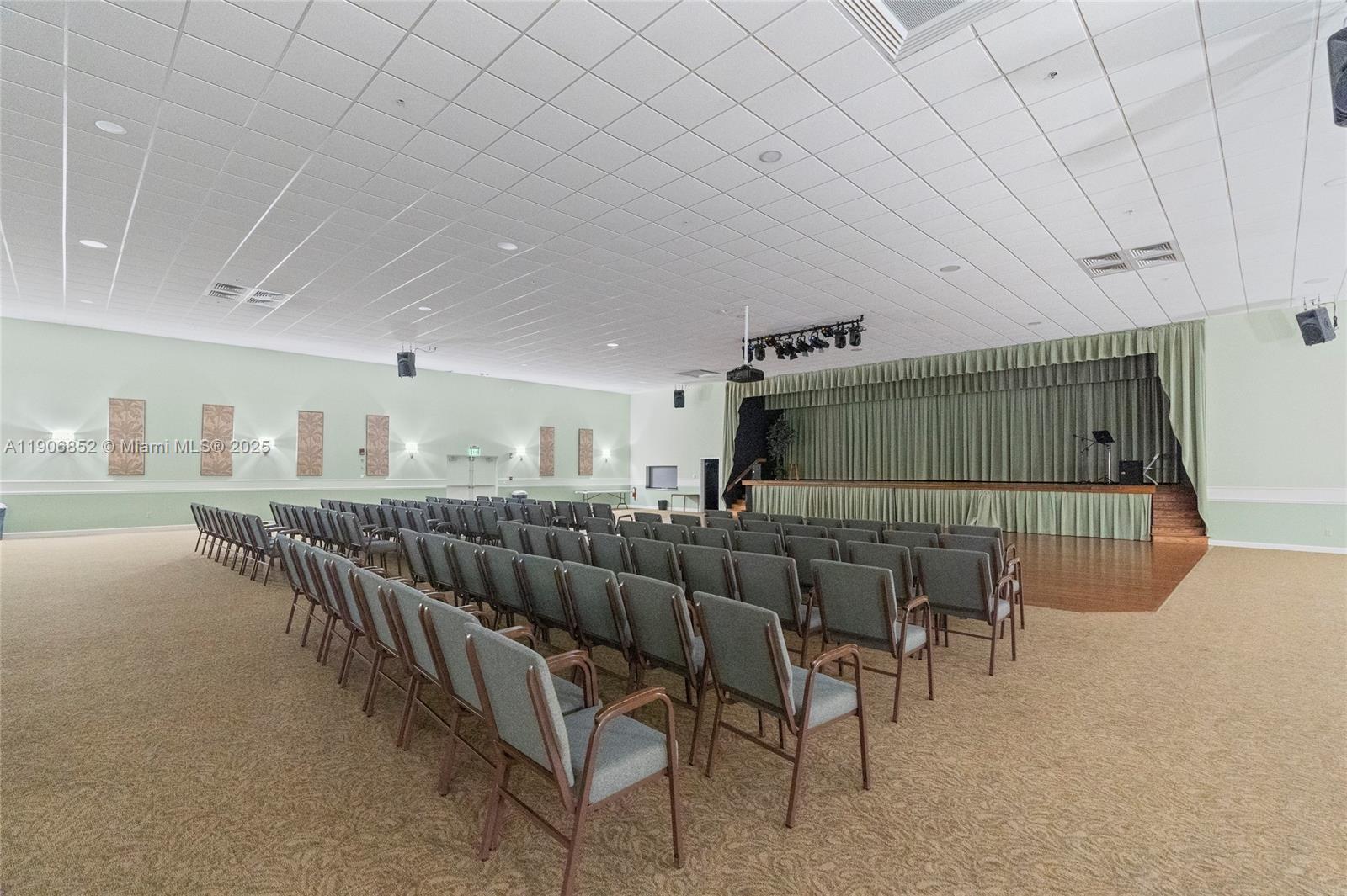 2520 Northeast 1st Court, Unit 204 Boynton Beach, FL 33435 - Photo 19 of 23 a bedroom with furniture and a rug