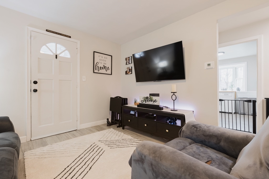 17 Souther Drive Worcester, MA 01602 - Photo 3 of 16 a living room with furniture and a flat screen tv