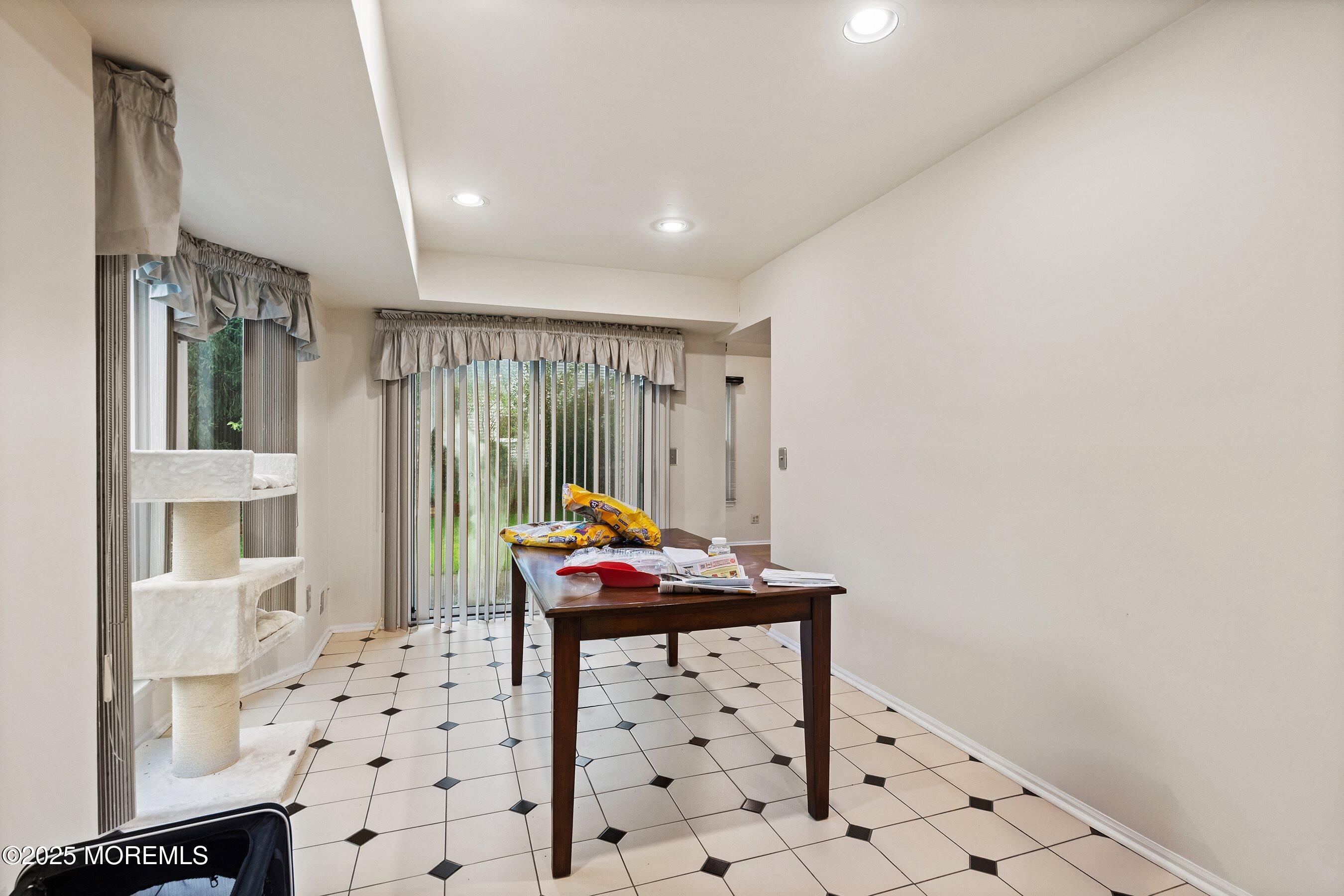 47 Sweet Gum Road Howell, NJ 07731 - Photo 13 of 27 a room with furniture a rug and a window