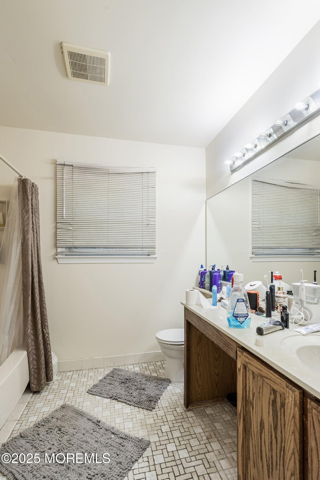 47 Sweet Gum Road Howell, NJ 07731 - Photo 19 of 27 a kitchen with a sink cabinets and appliances