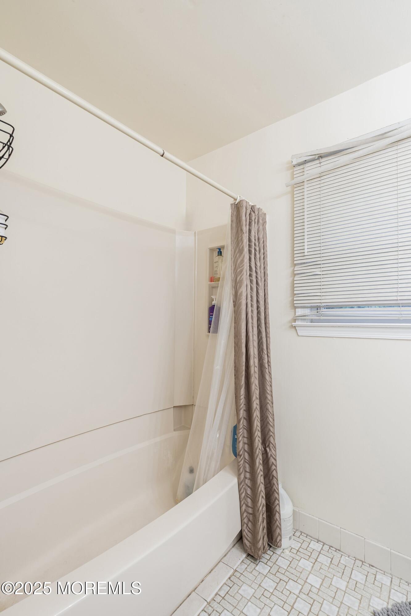 47 Sweet Gum Road Howell, NJ 07731 - Photo 20 of 27 a bathroom with a shower and a tub