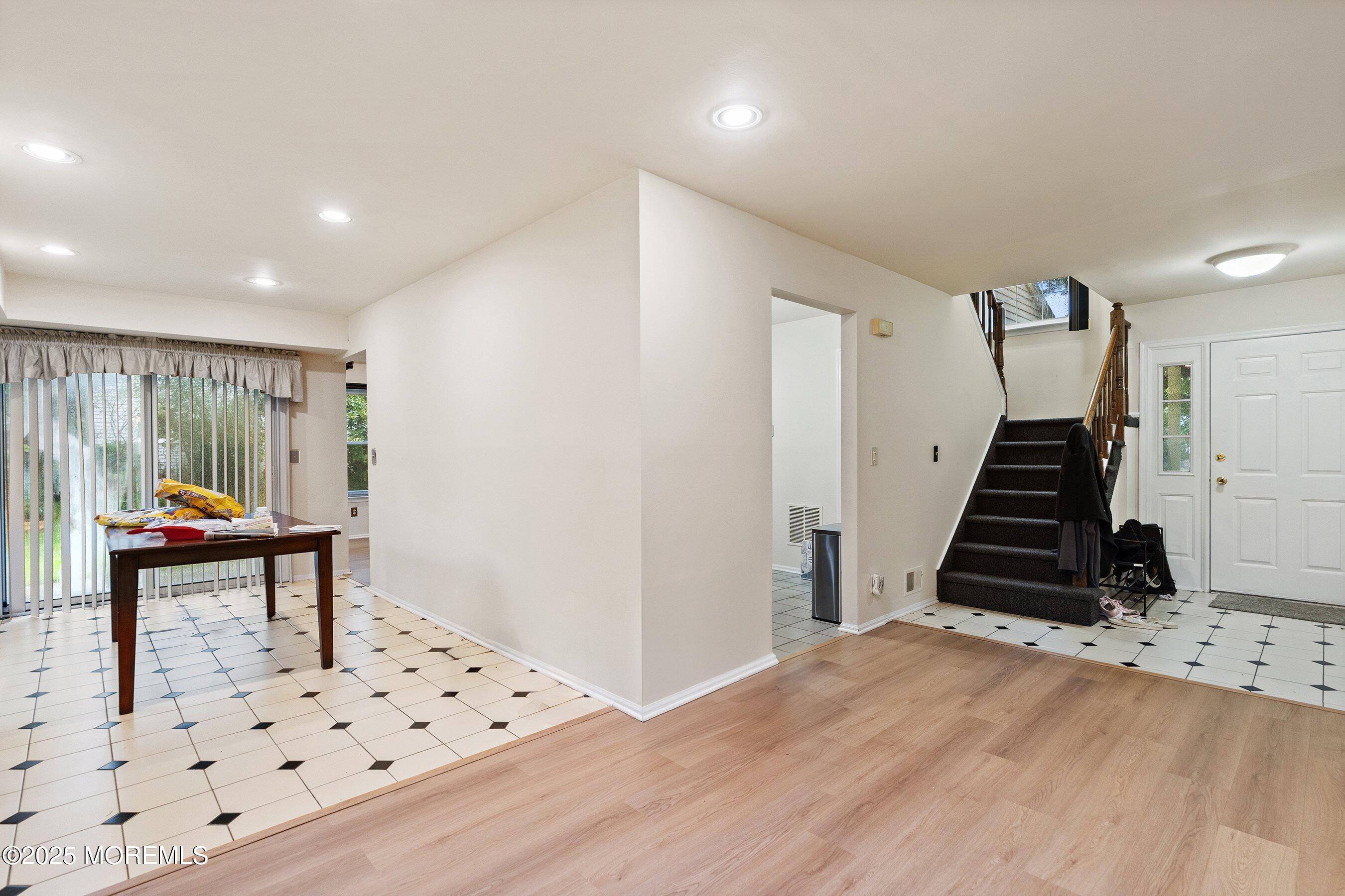47 Sweet Gum Road Howell, NJ 07731 - Photo 10 of 27 a view of entryway with stairs and wooden floor