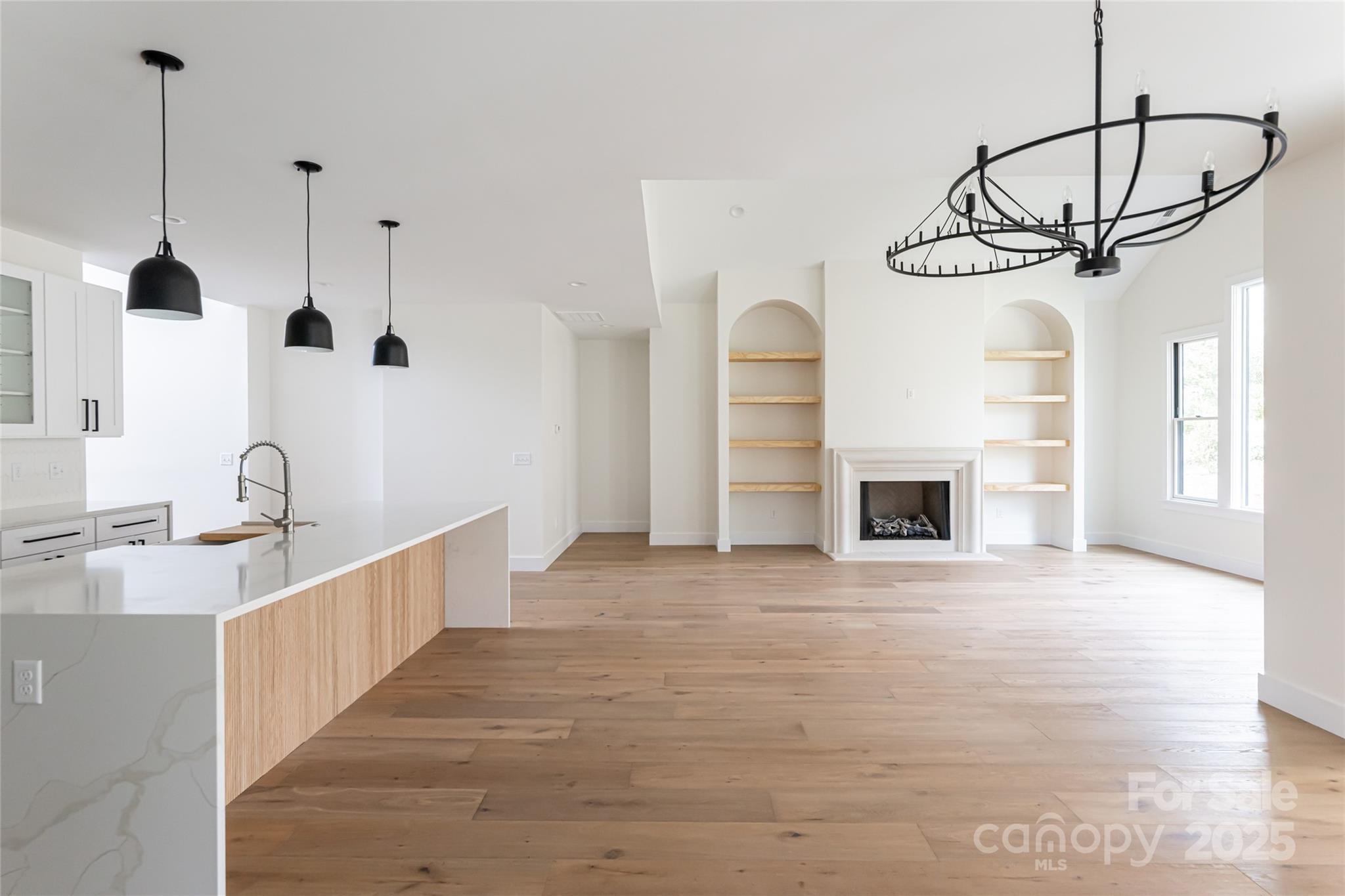 251 Bee Tree Road Swannanoa, NC 28778 - Photo 21 of 46 a view of a kitchen with furniture and chandelier
