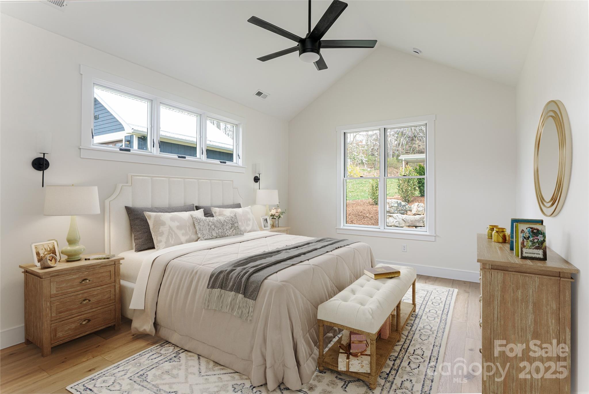 251 Bee Tree Road Swannanoa, NC 28778 - Photo 24 of 46 a bedroom with bed and window