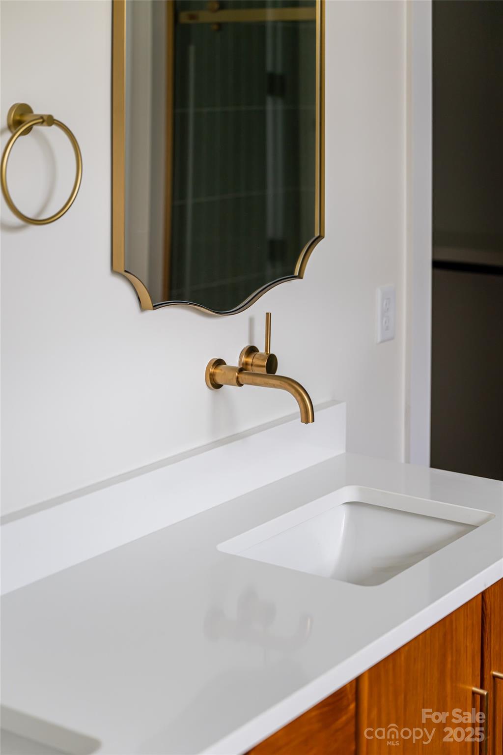 251 Bee Tree Road Swannanoa, NC 28778 - Photo 27 of 46 a bathroom with a sink and a mirror