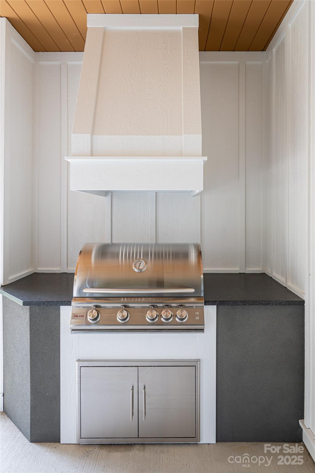 251 Bee Tree Road Swannanoa, NC 28778 - Photo 39 of 46 a stove top oven sitting inside of a kitchen